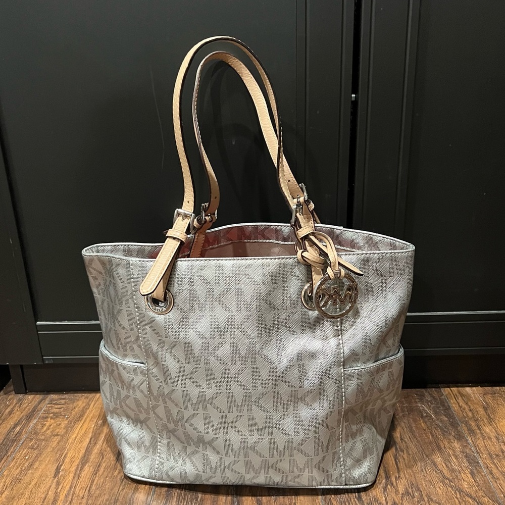 Silver metallic Micheal Kors monogrammed purse
